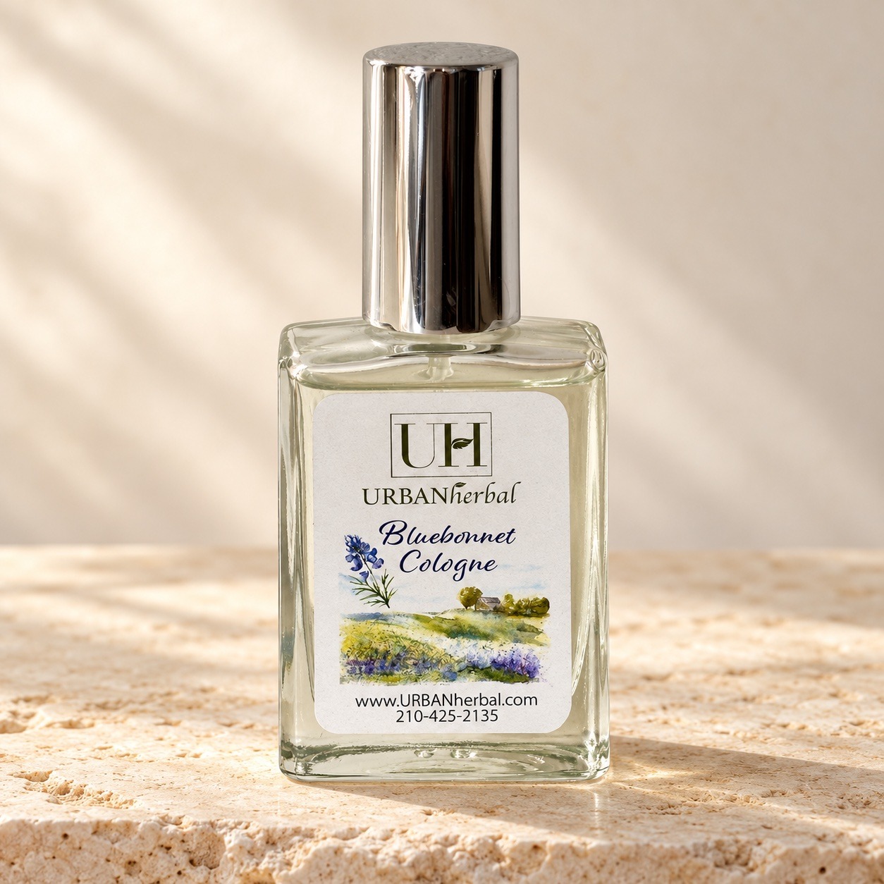 URBANherbal Bluebonnet Cologne on warm ivory stone