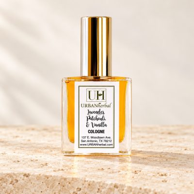 URBANherbal Lavender, Patchouli and Vanilla cologne on warm ivory stone