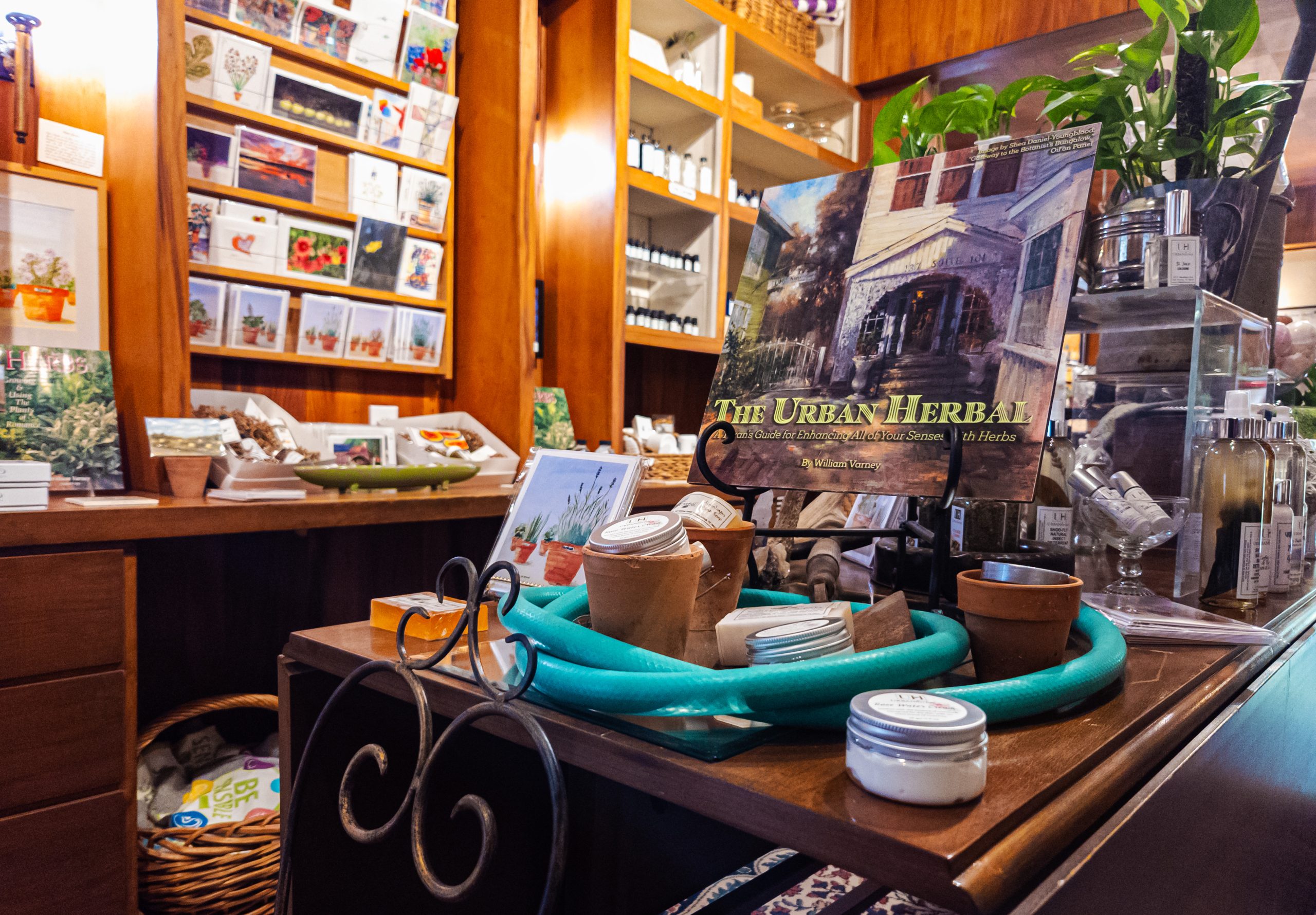 Herbal goods and William Varney’s book displayed inside the URBANherbal shop